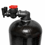 Close-up of the Clack C1190 in/out service head and 1 inch bypass on the black Vortech mineral tank of the non-backwashing whole house arsenic removal system: no electronics, no drain, nothing to program