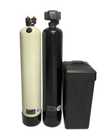 Clack 1.5 cu ft upflow acid neutralizer (white tank) beside the Fleck 5600SXT 48,000 grain water softener and its brine tank