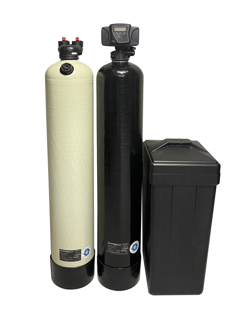 Clack 1.5 cu ft upflow acid neutralizer (white tank) beside the Fleck 5600SXT 48,000 grain water softener and its brine tank